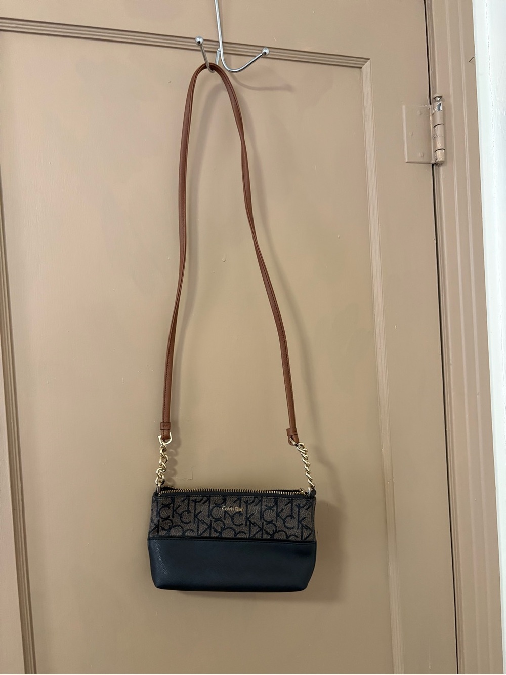 Calvin Klein Black and Brown Logo Crossbody with Gold Chain Accents